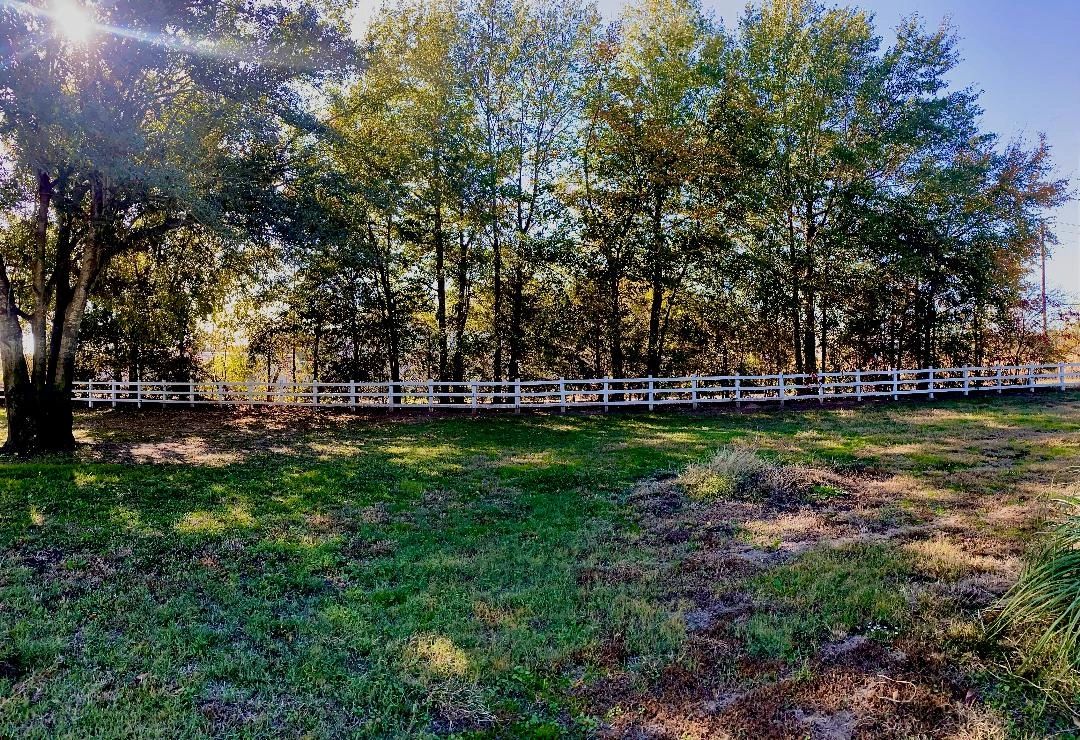 White fence at Park A, Paris Live Oaks RV Parks